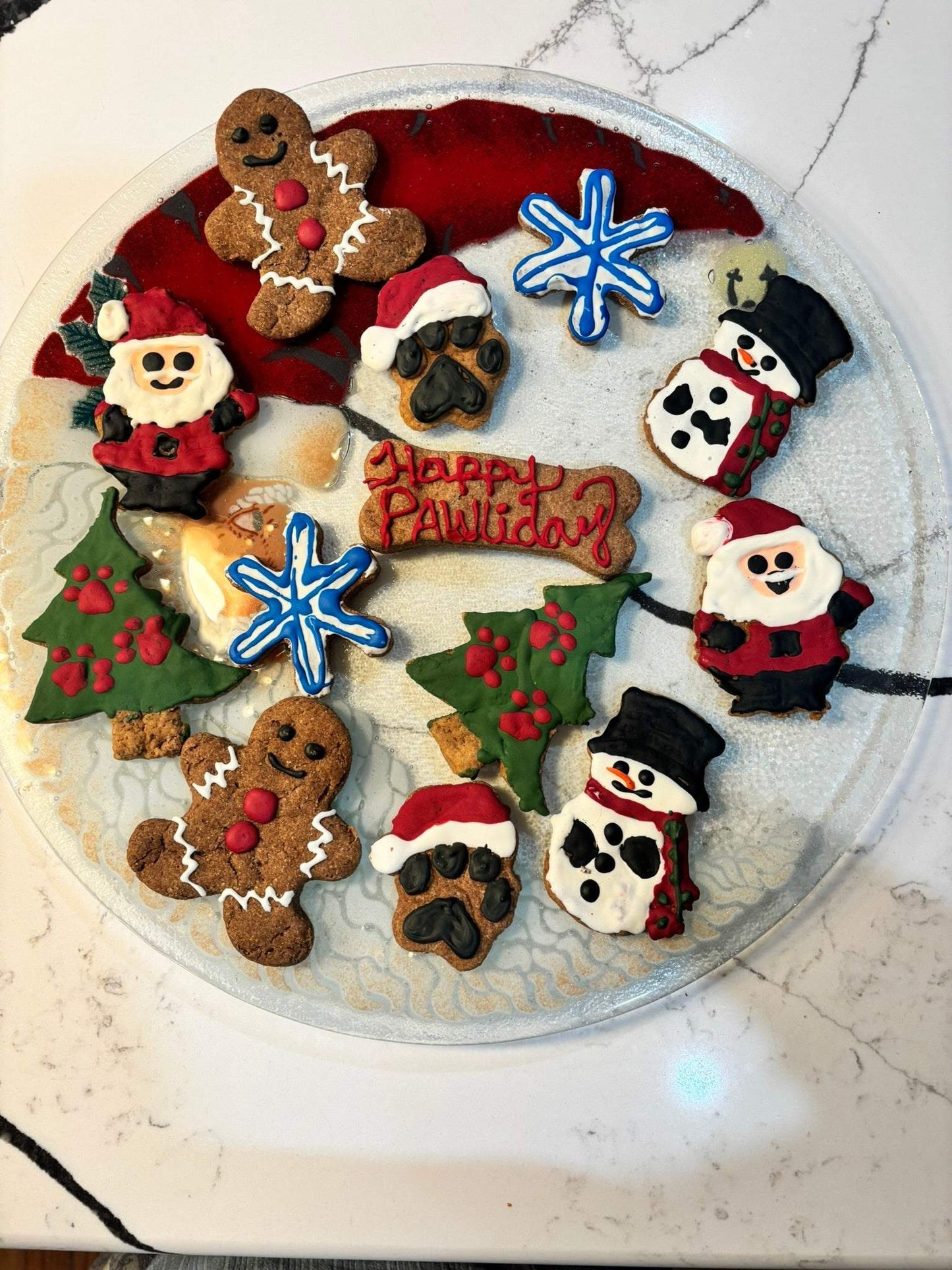 Whimsical Organic Christmas dog cookies assortment with festive shapes and natural ingredients