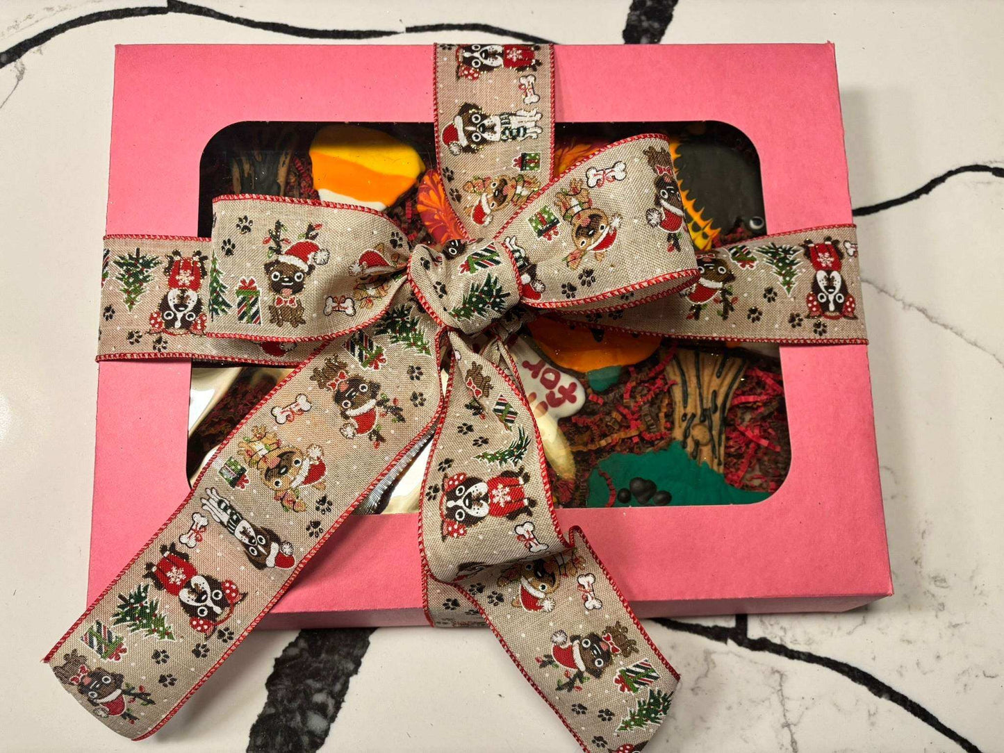 Thanksgiving organic dog cookie box with peanut butter treats in festive shapes