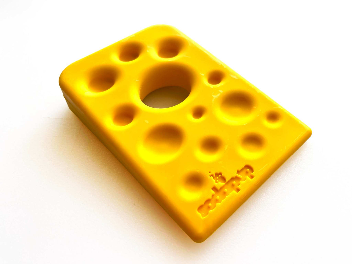 Bright yellow Swiss Cheese Wedge nylon dog chew toy with holes, durable for aggressive chewers