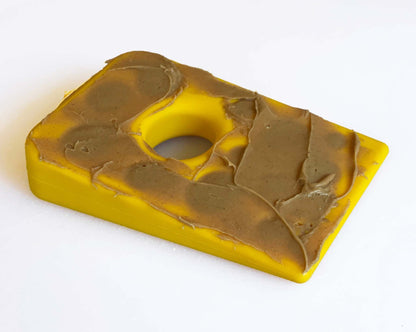 Swiss Cheese Wedge durable yellow nylon dog chew toy for aggressive chewers with a hole in the center
