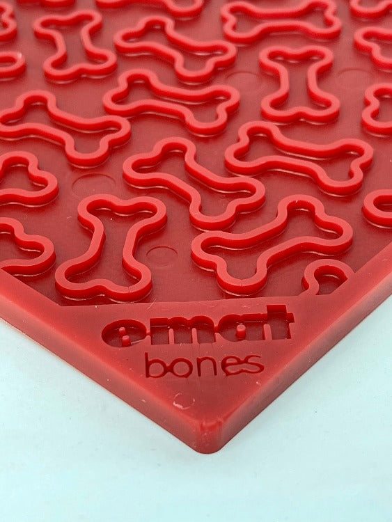 Purple Bones eMat dog lick mat with bone-shaped textured surface for anxiety relief and enrichment