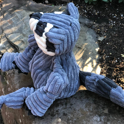 Reggie Raccoon Knottie® plush dog toy with durable Tuffut Technology and soft knotted design