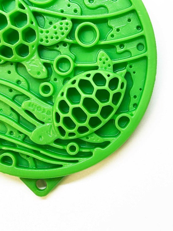 Green Water eCoin nylon enrichment Snacking Coin  with turtle motif and textured cavities for dog treats