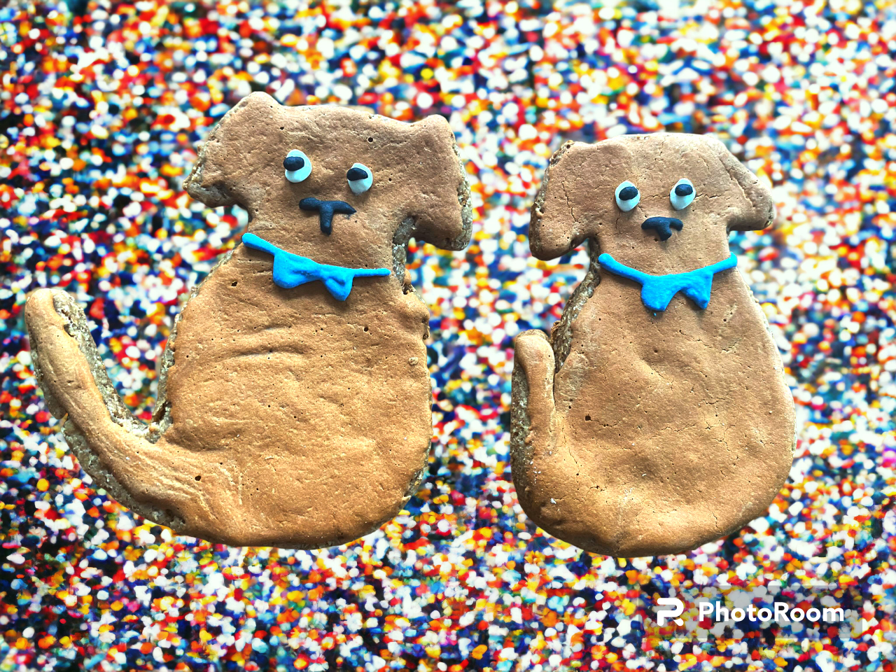 Organic Peanut Butter Cookies by Finn's shaped like dogs with blue bow ties on colorful sprinkle background