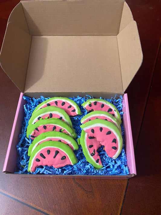 Box of organic watermelon dog cookies shaped like watermelon slices with peanut butter flavor