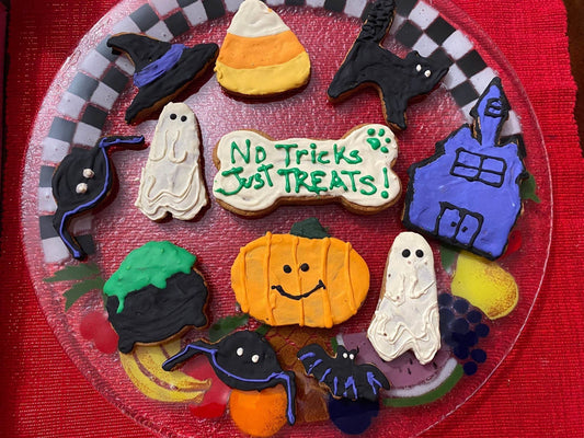 Halloween organic dog cookie box with festive peanut butter cookies shaped like pumpkins and ghosts