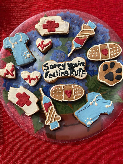 Get Well Organic Dog Cookie Box with decorated dog treats shaped like medical items and a message cookie saying Sorry you're Feeling RUFF
