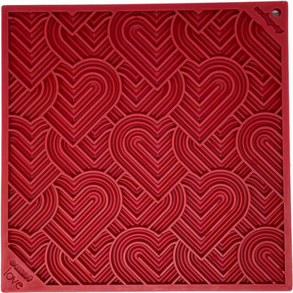 Red heart-shaped textured Love eMat enrichment lick mat for dogs and cats by SodaPup