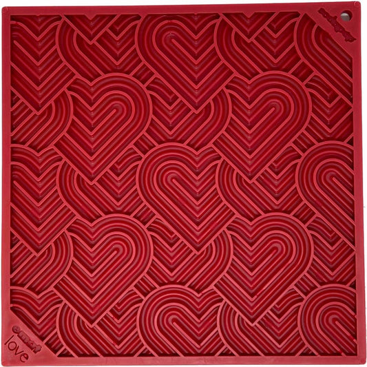 Red heart-shaped textured Love eMat enrichment lick mat for dogs and cats by SodaPup