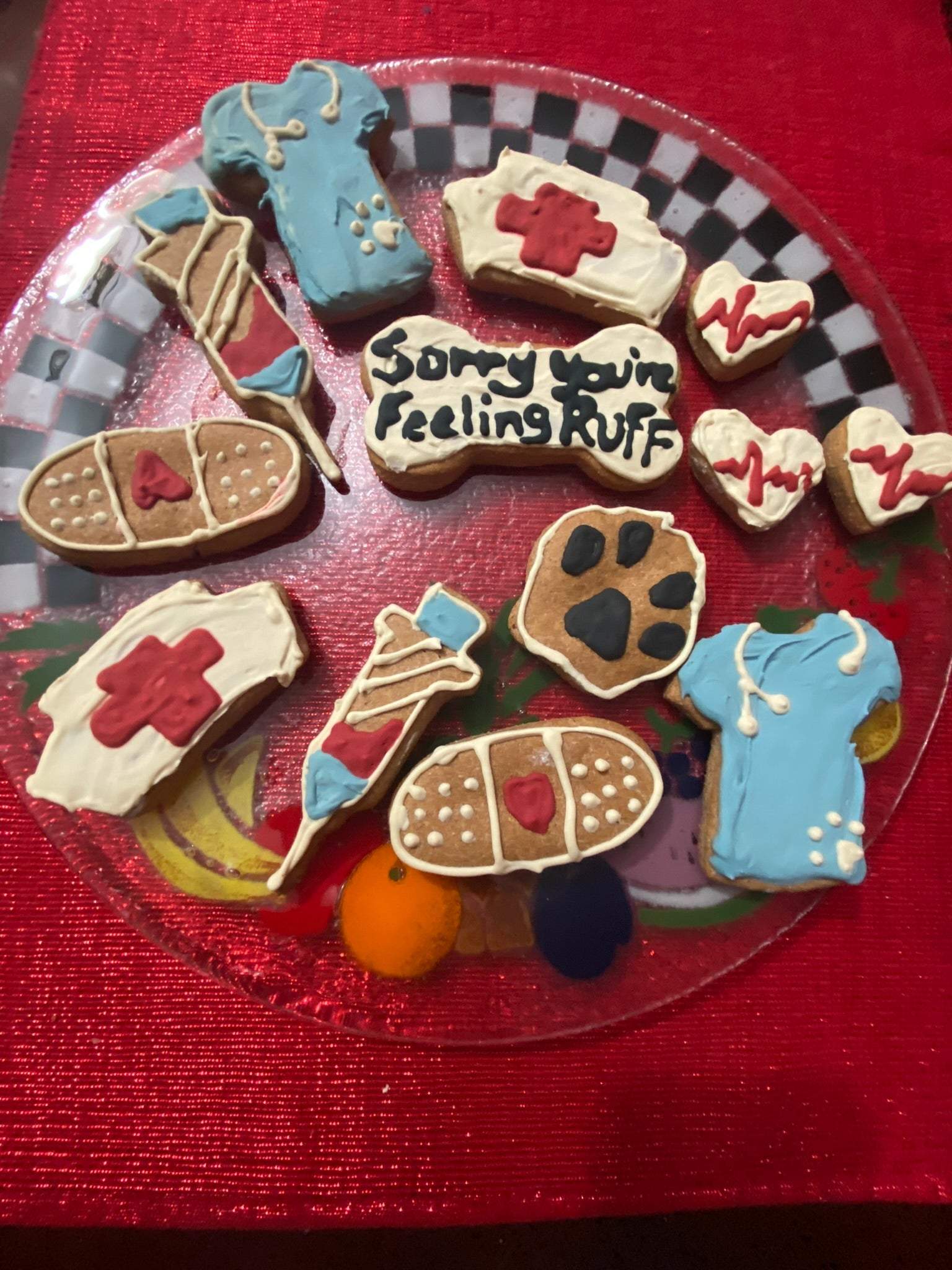 Get Well Organic Dog Cookie Box with peanut butter and medical-themed dog treats on red plate