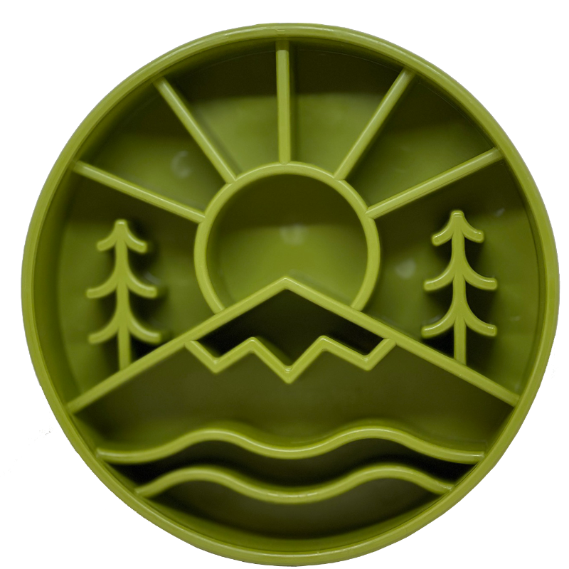 Green slow feeder dog bowl with mountain and tree design for slow eating and mental enrichment