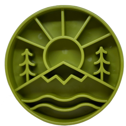 Green slow feeder dog bowl with mountain and tree design for slow eating and mental enrichment