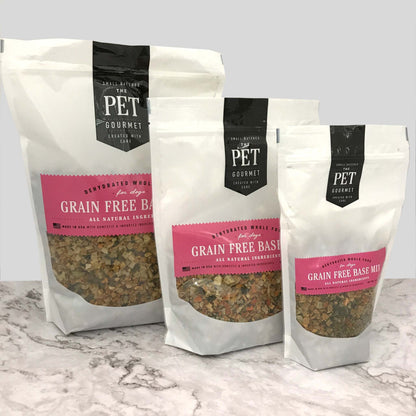 grain free dog food premix bags in three sizes on marble surface