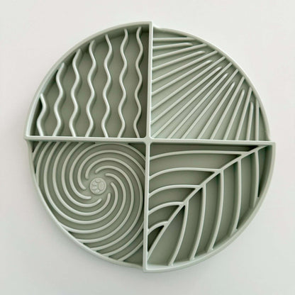 Lick Mat Circle with segmented textured patterns for pet entertainment and stimulation