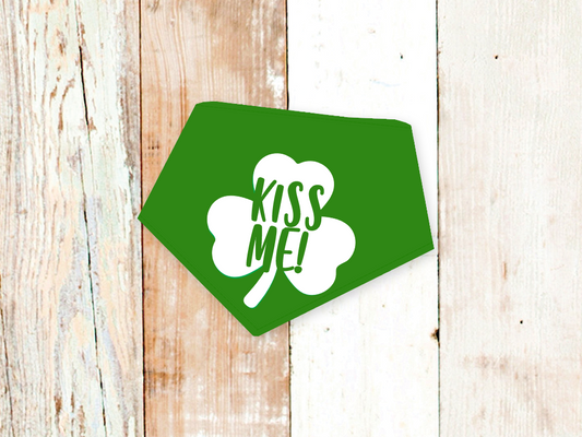 Green "Kiss Me" dog bandana with white shamrock design and adjustable snap closures