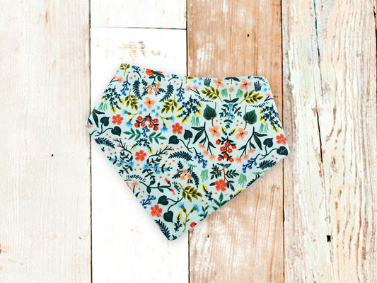 Mint Wildflower dog bandana with floral print and adjustable snap closures for stylish pups