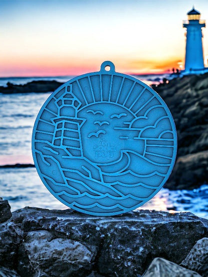 Lighthouse eMat dog lick mat with suction cups, blue textured enrichment mat by rocks at sunset