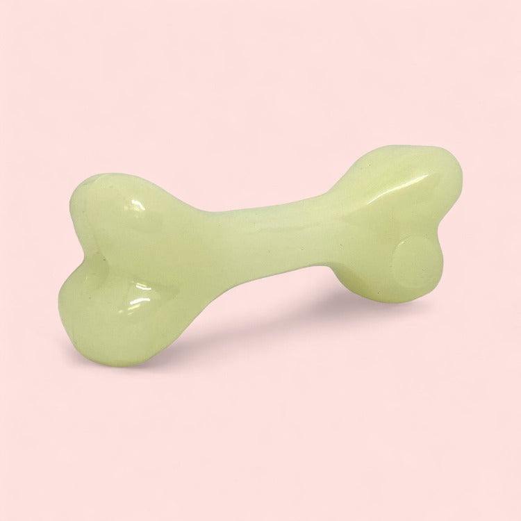 Glow-in-the-dark PUP-X rubber bone dog toy for large aggressive chewers, floats on water, durable and safe USA-made chew toy