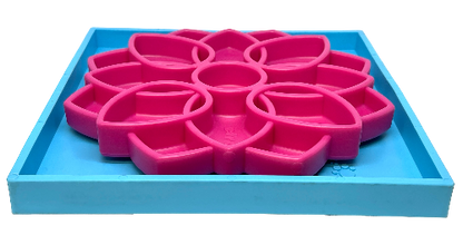 SodaPup Hold 'em suction cup holder securing pink lick mat on blue tray for dogs