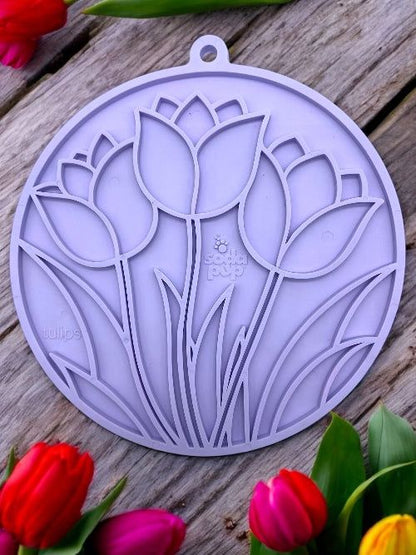 Light purple tulip design enrichment lick mat for dogs with suction cups on wooden surface