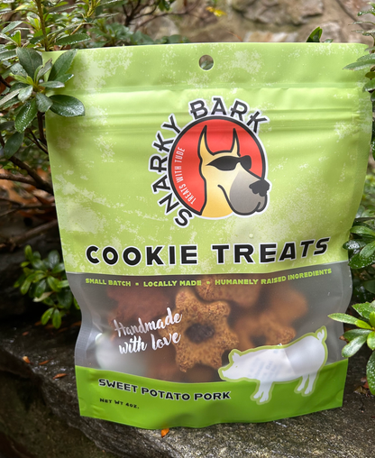 Snarky Bark sweet potato pork dog cookie treats in eco-friendly packaging