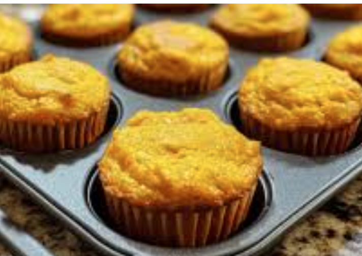 Organic pumpkin muffins for dogs baked in a muffin tin with soft texture and natural ingredients