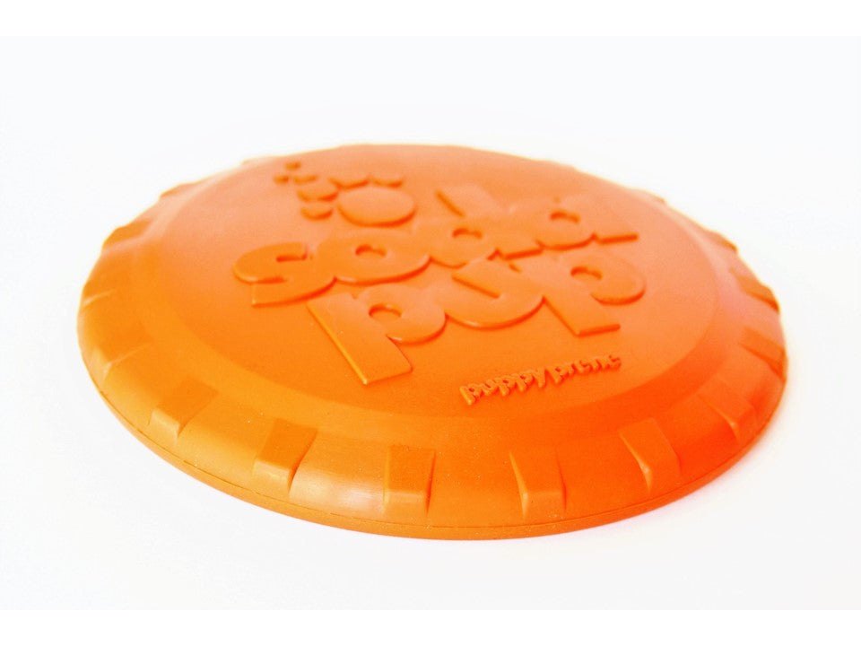 Orange durable rubber Bottle Top Flyer dog retrieving frisbee shaped like a bottle cap