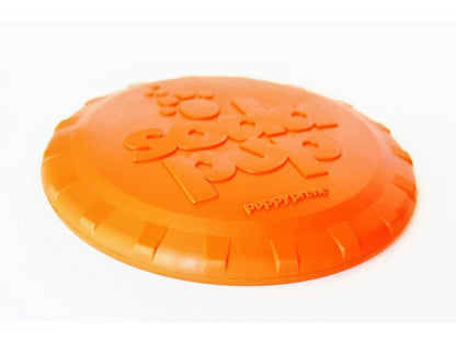 Orange durable rubber Bottle Top Flyer dog retrieving frisbee shaped like a bottle cap
