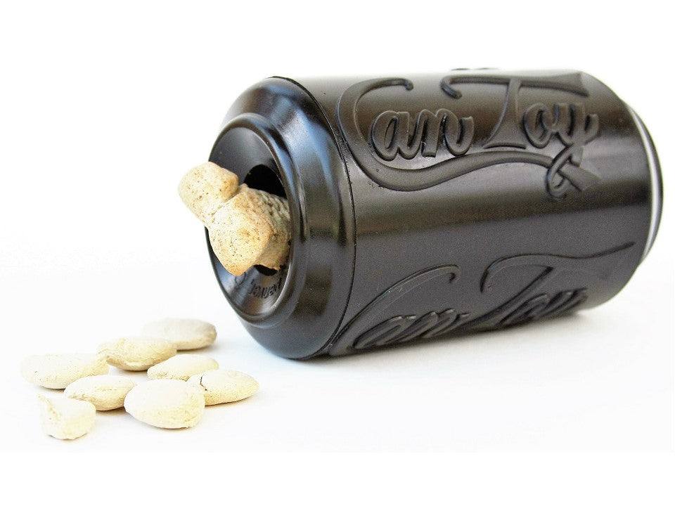 SP Magnum Can Toy durable black rubber chew toy and treat dispenser for power chewers with dog treats spilling out