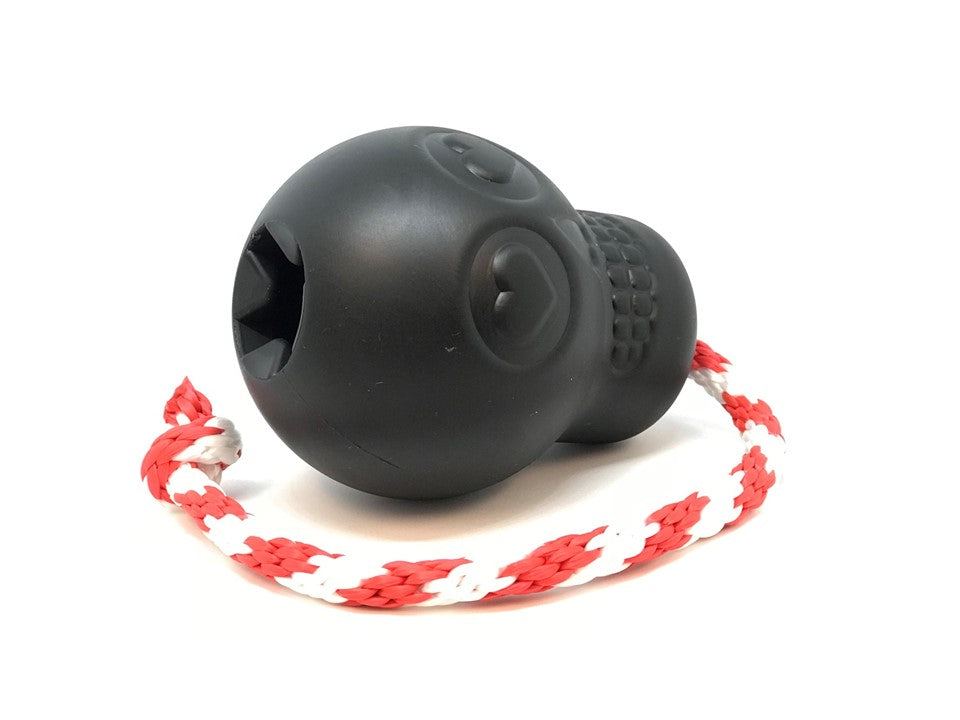 Black USA-K9 Magnum Skull durable rubber chew toy with rope, treat dispenser and tug toy for dogs