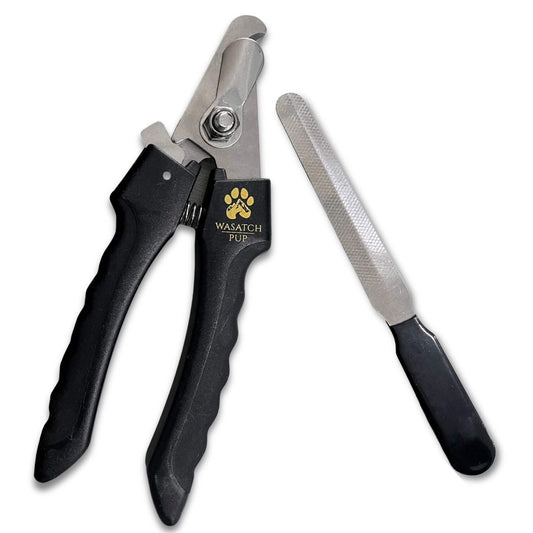Ergonomic dog nail clippers with sharp stainless steel blades and included nail file for precise grooming