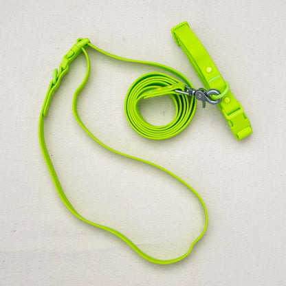 Bright green PVC handsfree dog leash with adjustable strap, waterproof and durable design.