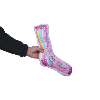 Squeaky sock plush dog toy with unicorn design and colorful rainbow pattern for gentle play