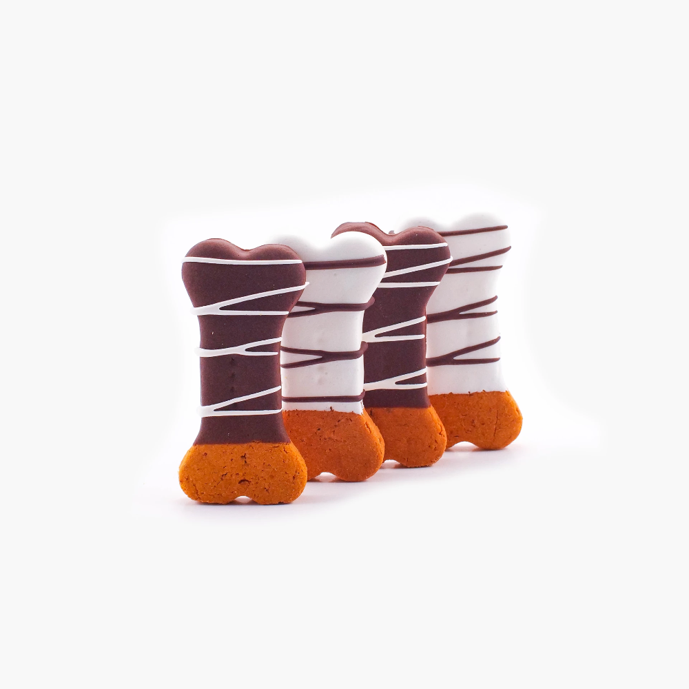 Dipped Bones dog treats with peanut butter and yogurt icing, healthy and nutritious dog biscuits