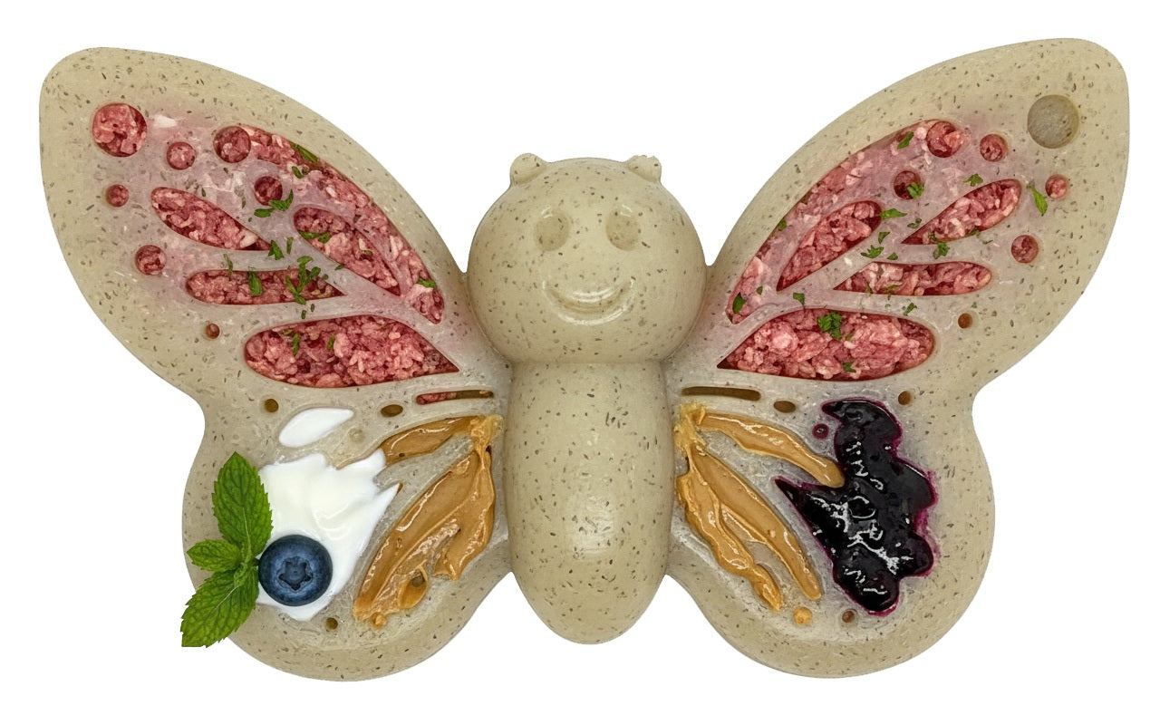Butterfly shaped nylon dog chew toy with textured wings for spreading treats, designed for aggressive chewers and enrichment licking.