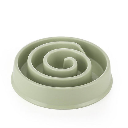 Anti-Choke Slow Feeder Bowl in pale sage-green plastic, with a raised spiral maze ridge to slow eating.