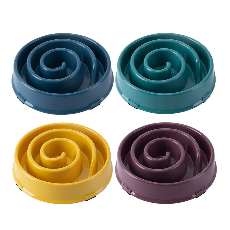 Anti-Choke Slow Feeder Bowl in durable plastic, shown in navy, teal, yellow and plum with raised spiral ridges.