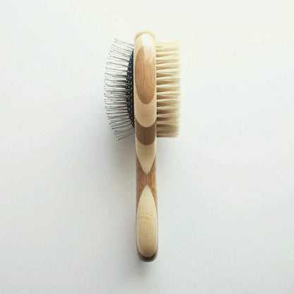 Two-sided pet brush with bamboo handle featuring bristle and wire sides for shedding and detangling