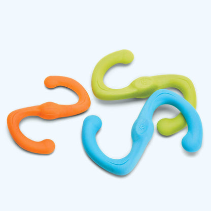 Bumi flexible S-shaped dog toys in bright orange, green, and blue made of durable thermoplastic rubber for gentle chewers