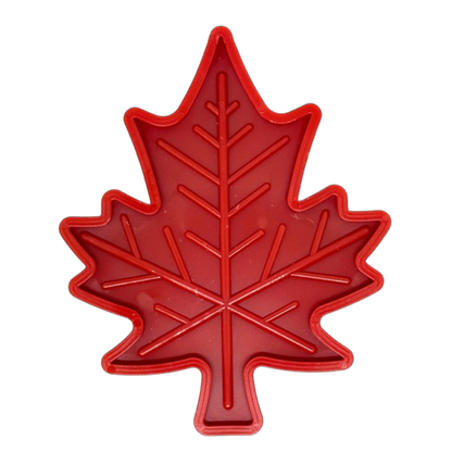 Red Canadian Maple Leaf shaped indestructible nylon dog chew toy with textured surface for power chewers