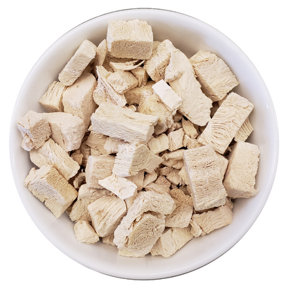 bowl of freeze dried chicken breast dog treats high protein single ingredient