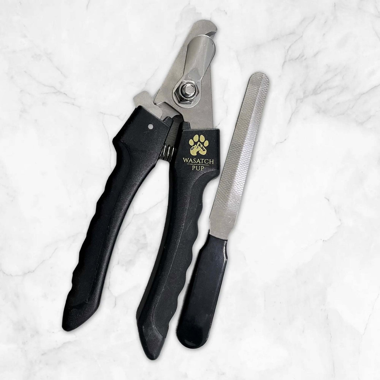 Dog nail clippers with sharp stainless steel blades and ergonomic non-slip handle including nail file for grooming