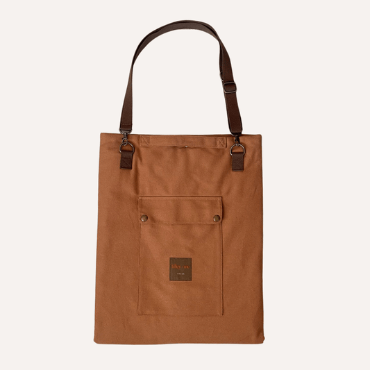 Convertible dog bag that unfolds into a portable travel mat for pets