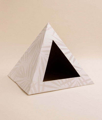 Neutral Palm cardboard cat pyramid with palm leaf design and triangular entrance for cozy cat hideaway