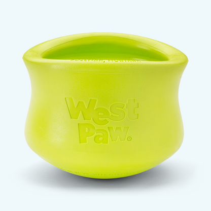 Customizable puzzle and treat toy in bright lime green durable rubber with West Paw logo embossed, designed for dogs