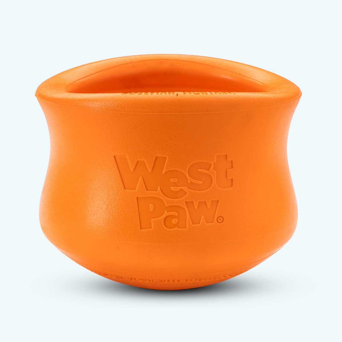 Orange durable rubber customizable puzzle and treat toy for dogs with embossed West Paw logo and wide opening