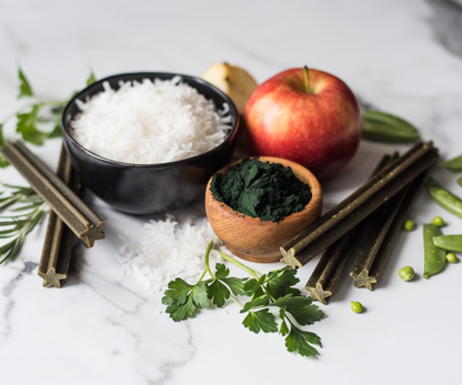 Star-shaped grain free Dental Support Chews with organic spirulina, apples, turmeric, parsley, and peppermint oil for dog dental health.