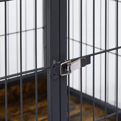 Dog Crate Side Table with black steel bars and a silver metal latch securing the front door