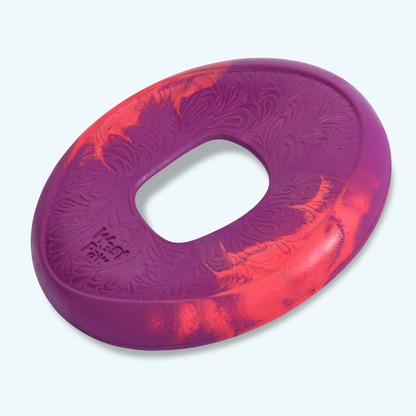 dogs favorite high-flying disc in purple and orange with an oval center hole and textured surface