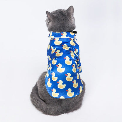 French Bulldog wearing soft pet silk duck pajamas with button closure and duck pattern